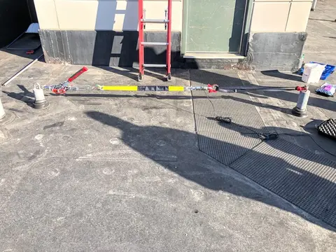 Rooftop anchor load testing rig